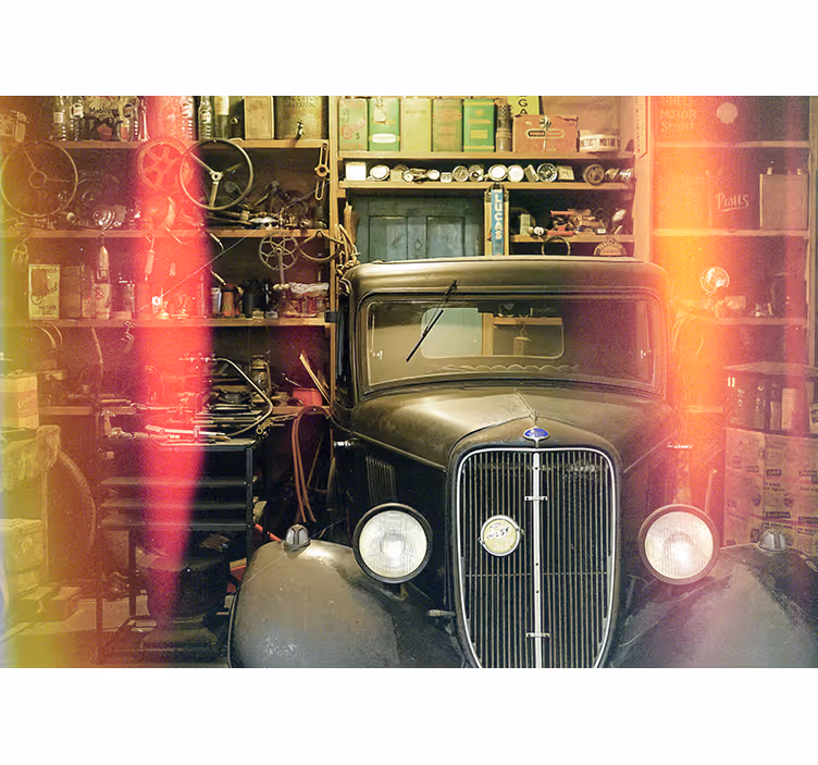 Vintage vehicule in garage Car wall mural - TenStickers
