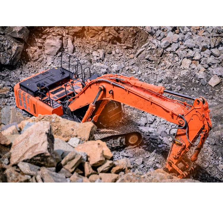 Excavator picking up rocks photo wallpaper - TenStickers