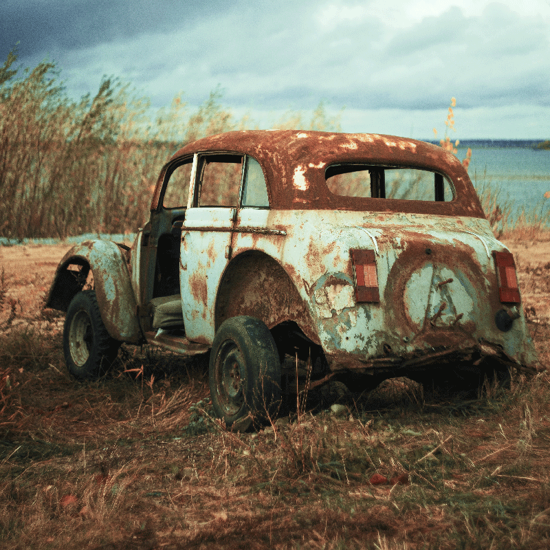 Living room poster of a weathered car in the fields - TenStickers
