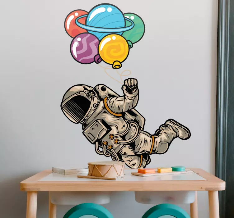 Astronaut floating in space with balloons decal - TenStickers