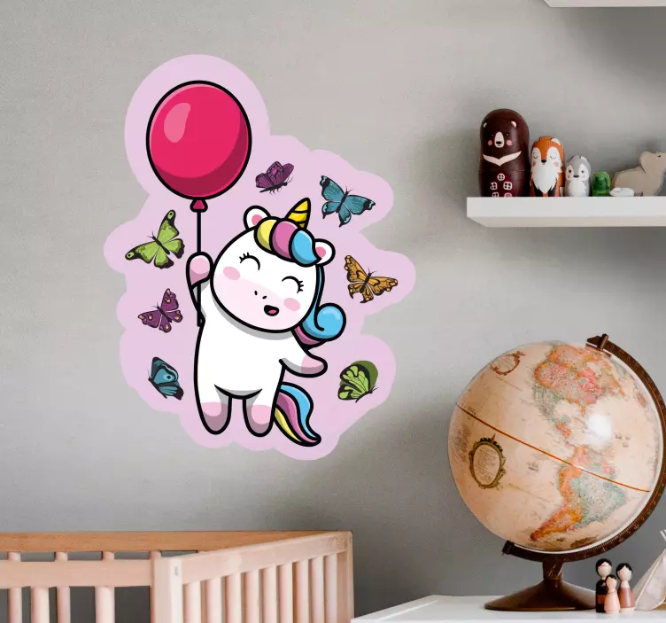 Playful unicorn with balloon wall sticker for kids - TenStickers