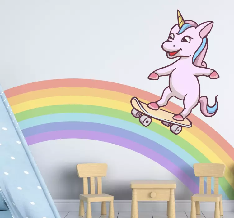 Unicorns skating on rainbow sticker - TenStickers