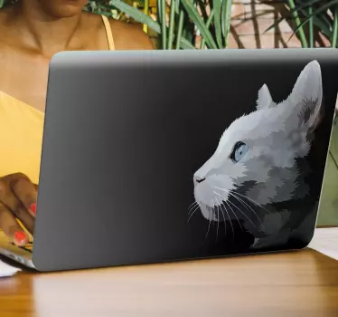 Cat face with blue eyes laptop sticker - TenStickers