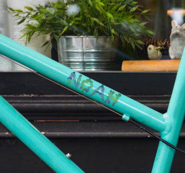 Melted personalized name Bike Decal - TenStickers