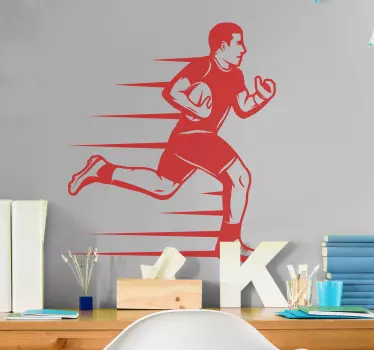 Runing player witth the ball rugby sticker - TenStickers