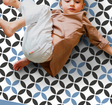 White diagonal lines with black and blue shapes tile mat - TenStickers